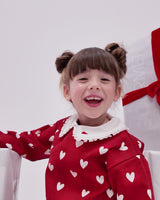 CONJUNTO SUDADERA CORAZONES Y FALDA ROJA CON LEOTARDOS